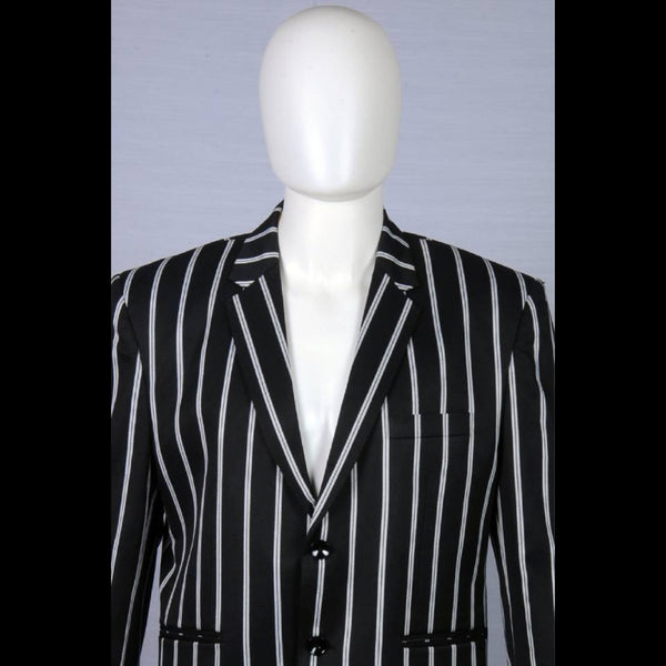 JK’s Suit: Sleek Black Coat adorned with White Stripes, paired flawlessly with Jet-Black Pants